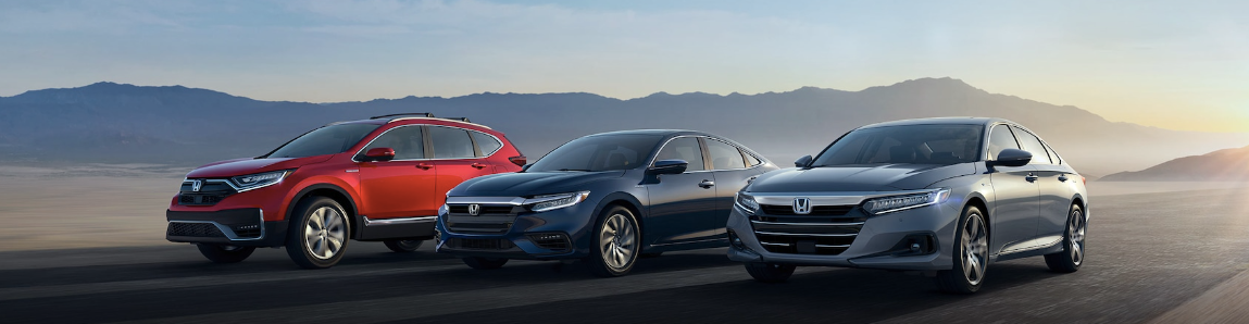 Honda models racing down a highway