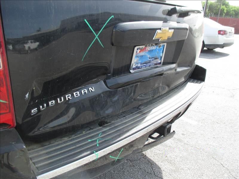 Chevy Suburban Rear Cargo Dent Before Repair