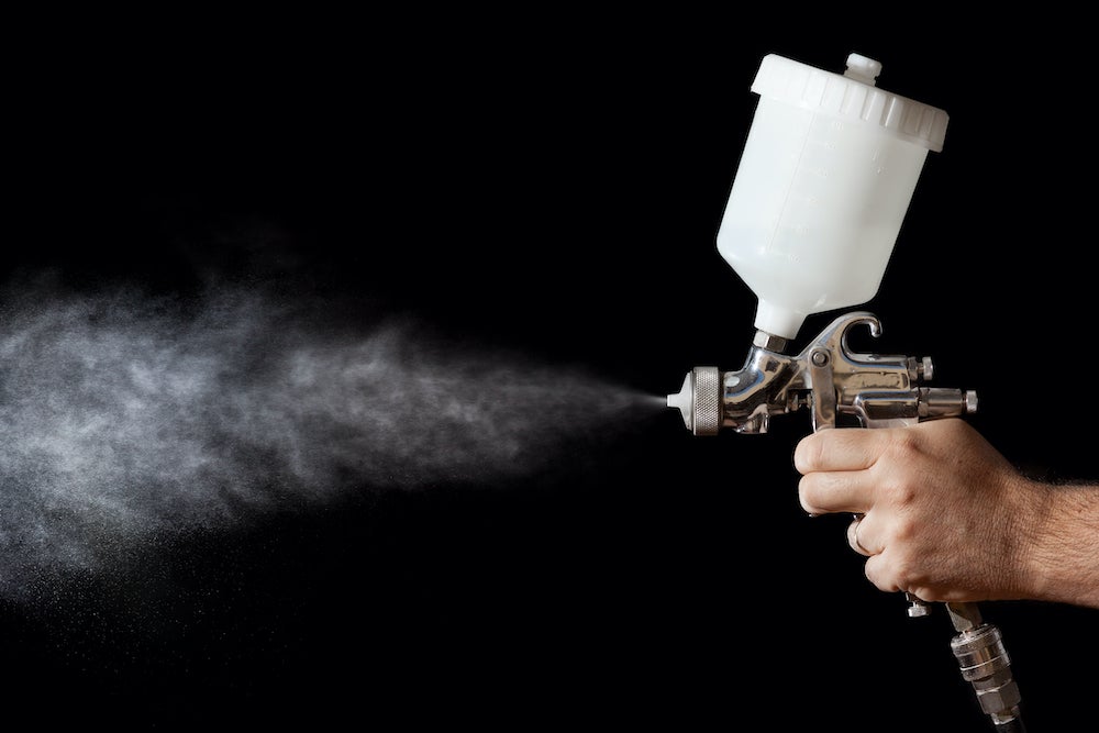 paint spray gun spraying